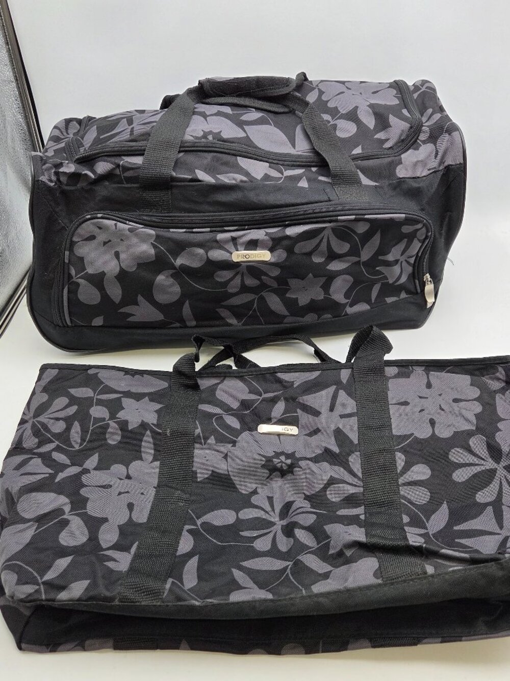 Prodigy 2 Piece Travel Set Rolling Duffel Bag & Tote Black Purple Luggage Set